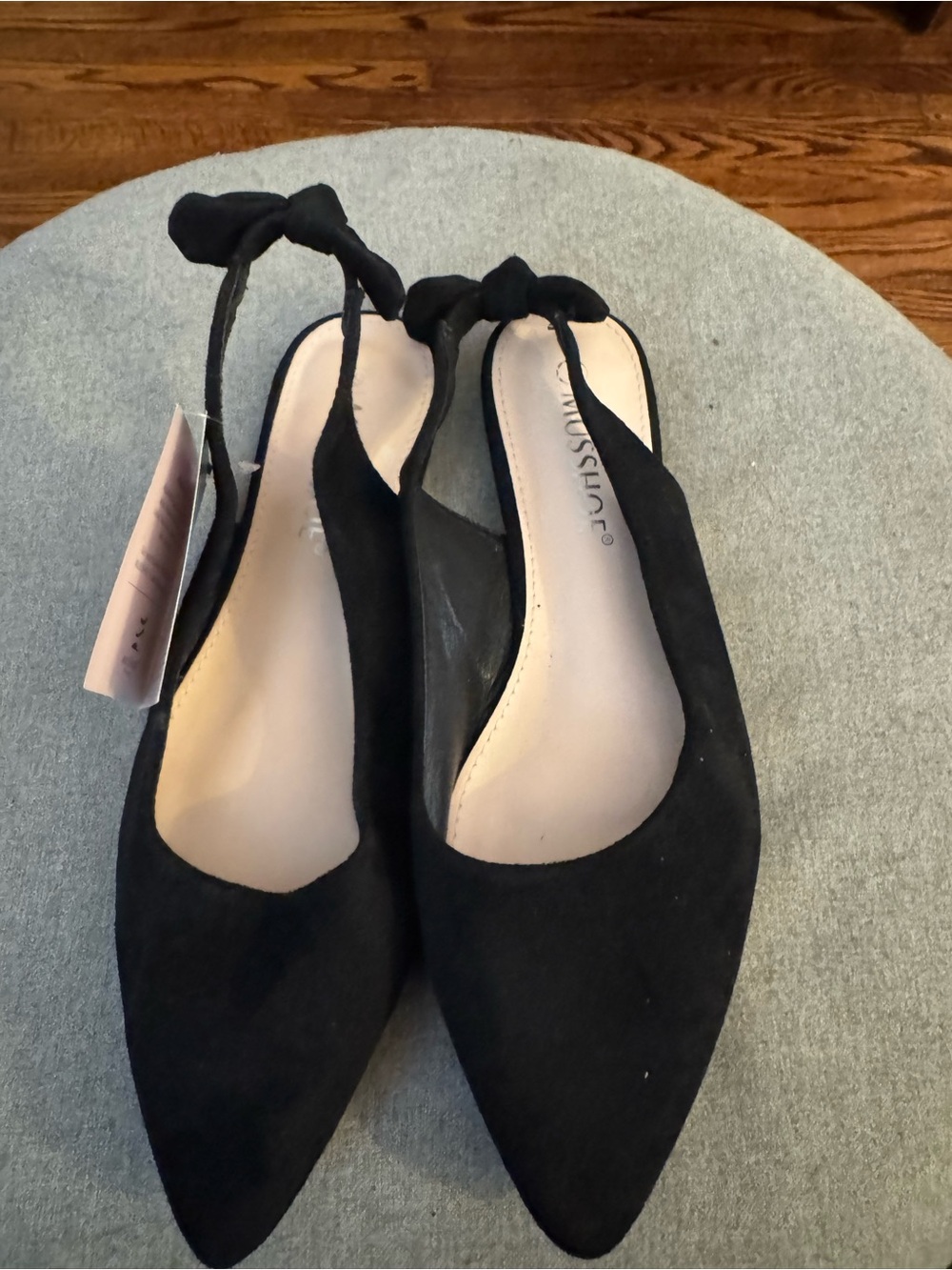 Black Pointed-Toe Slingback Flats with Knot Detail